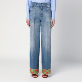 Blue washed jeans with jacquard bottoms